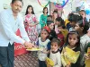  सीएससी दिवस पर वीएलई ने बच्चों को वितरित किया कापी पेंसिल 